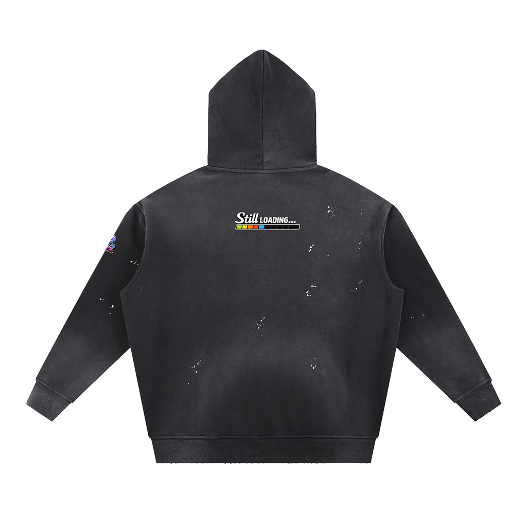 Black hoodie with 'Still Loading' text on the back against a white background