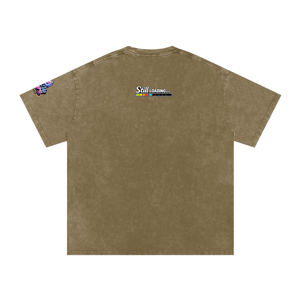 Brown t-shirt with 'Still Loading...' text and colorful graphics on a white background