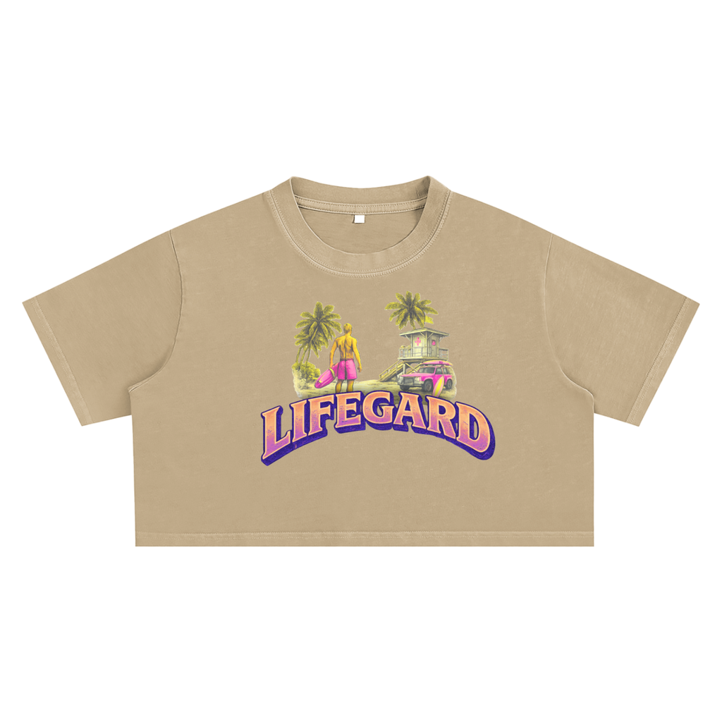 Beige crop top with 'LIFEGARD' graphic design on a white background